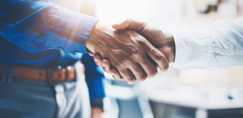 Two businessmen shaking hands
